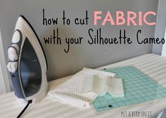 how to cut out fabric with your silhouette cameo iron and cutting mat on the table