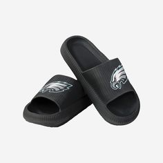 Step to it, superfan. You can show off the passion in your soul AND on your sole with these Philadelphia Eagles Women's Team Color Pillow Slides. Features All-over team-colored design so you can rep your team in style Bold team logo display on each strap, in case there were any doubts where your allegiances lie Slip-on style with open-toe design to keep you cool, even in the heat of competition Details Material: EVA Officially licensed Imported Eagles Shirt, Pillow Slides, Nfl Teams Logos, Logo Display, Slides Sandals, The Passion, Colorful Pillows, Philadelphia Eagles, Nfl Teams