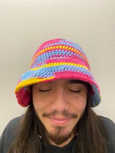 100% Cotton Bucket Hat in Pride Flag Color Schemes Handmade crocheted hat Size 1 head diameter is 20 in/50 cm Size 2 head diameter is 24 in/60 cm Casual Yarn Hats One Size, Yarn Cap For Vacation, Knitted Yarn Bucket Hat, Casual Crochet Hat For Winter Vacation, Multicolor Crochet Hat With Short Brim, Casual Multicolor Beanie Mini Hat, Casual Multicolor Crochet Hat With Curved Brim, Casual Multicolor Mini Hats With Curved Brim, Adjustable Crochet Beanie For Vacation