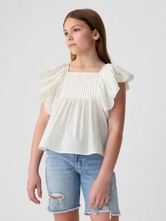 Saw this on Gap: Gap Ruffled Short Sleeve Tops, Spring Square Neck Tops With Lace Trim, Spring Square Neck Top With Lace Trim, Square Neck Cotton Tops With Ruffles, Feminine Scalloped Edges Top For Summer, Short Sleeve Cotton Tops With Scalloped Edges, Cotton Short Sleeve Tops With Scalloped Edges, Feminine Cotton Tops With Scalloped Edges, Fitted Cotton Tops With Scalloped Edges