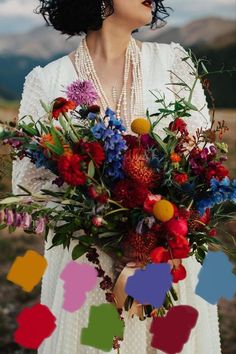 a woman in a white dress holding a bouquet of flowers with colorful squares around her