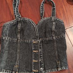 Washed Black Denim Crop Top. 4 Silver Buttons In The Front And A Nice Accordion Stretch In The Back. Casual Black Denim Top, Black Denim Top For Summer, Summer Black Denim Top, Casual Black Denim Top For Spring, Trendy Black Denim Top For Spring, Casual Dark Wash Denim Top For Night Out, Trendy Black Cotton Denim Top, Trendy Black Denim Top, Black Denim Top For Night Out