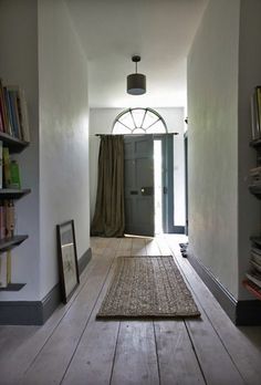 the hallway is clean and ready to be used as a home decorating project for someone's house