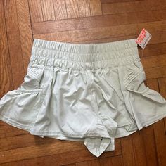 Free People Fp Movement Get Your Flirt On Shorts Glacial Mist Size Xs Seafoam High Waist Athletic Shorts With Pockets For Spring, Spring Activewear With Pockets, Short Length, Spring Workout Shorts With Pockets, Get Your Flirt On Shorts, Seafoam Color, Free People Shorts, Fp Movement, Shorts Athletic, Sea Foam