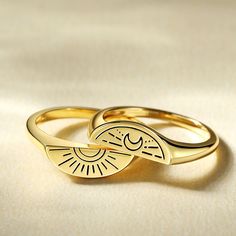 Make a pinky-promise with your best friend with our friendship rings. The ring set is a play on the 80’s trend of gifting a part of a ring to a fellow sister. The signet ring is split into two, with a sunlight design on one ring and a moonlit horizon design on the other. A unique piece which can be worn together or stacked separately.Weight: 5 gWidth: 2 mmHeight: 2.2 mmThickness: 1.5 mmMaterial: 925 SilverPlating Color: Yellow Gold Trendy Open Ring For Promise Occasion, Trendy Open Ring For Promise, Stackable Couple Rings For Promise, Trendy Stackable Rings For Anniversary, Trendy Personalized Rings For Promise, Trendy Personalized Promise Ring, Sun And Moon Design Adjustable Promise Rings, Minimalist Sun And Moon Promise Ring, Minimalist Sun And Moon Design Promise Ring