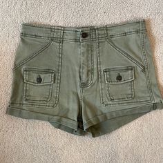 Abercrombie And Fitch High Rise Green Shorts. New, Never Been Worn. Excellent Condition. Comes From A Pet Free And Smoke Free Household. Size 4. Waist 27 Inches. High Rise Utility Cargo Shorts For Spring, High Rise Cargo Shorts With Pockets For Spring, Utility Jean Shorts For Spring, Casual High Rise Cotton Cargo Shorts, High Rise Casual Cotton Cargo Shorts, Summer High Waist Utility Jean Shorts, High Rise Cotton Cargo Shorts Casual Style, Summer Mid-rise Cotton Cargo Shorts, High Waist Utility Jean Shorts For Summer