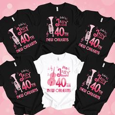 "Celebrate the vibrant spirit of turning 40 in the heart of New Orleans with our Jazzy Birthday Shirts! Crafted for comfort and style, these cute Nola 40th tops capture the dynamic energy of the Crescent City's legendary jazz scene. Adorned with sleek designs and a touch of flair, they're the perfect attire for your birthday crew as you embark on the lively journey of Bourbon Street and the soulful melodies of NOLA.  Whether you're sipping hurricanes, exploring the French Quarter, or dancing to the rhythm of jazz, these shirts make a stylish statement. Elevate your 40th birthday celebration with our Jazzy Birthday t-shirts, a harmonious blend of youthful exuberance and the timeless charm of New Orleans. Let the good times roll as you jazz up your milestone celebration in the heart of this 21st Birthday New Orleans, New Orleans Birthday, Nola Trip, 30th Birthday Shirts, The French Quarter, Bourbon Street, Group Shirts, Big Easy, Good Times Roll