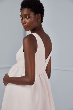 An empire waist leaves room for the baby bump in this charming maternity style rendered in textured faille fabric. The bodice’s front and back feature mirrored V lines. Shown in Ballet. Amsale Bridesmaid, Amsale Dress, V Lines, Ice Dresses, Pregnant Wedding, Maternity Photography Poses, Maternity Style, Ballet Dress, Pregnancy Outfits