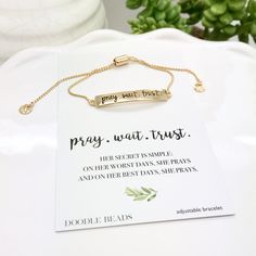 "Gold or silver Bar Bracelet with the phrase \"pray. wait. trust\" stamped on it. This dainty bracelet is adjustable to fit most any size wrist. Choose gift box packaging or with card and quote as shown in photo: \"Her secret is simple: on her worst days, she prays and on her best days, she prays.\" Give her some love, support and positive vibes. Choose carded with quote or without the quote and in gift box packaging. J E W E L R Y ∙ D E T A I L S * MATERIAL: Brass with real silver Rhodium or 18 Pray Wait Trust, Best Advice Quotes, Silver Bar Bracelet, Prayer Gifts, Trust In God, Prayer Bracelet, Curved Bar, Bar Bracelet, Gold Armband