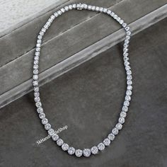 36 TCW Round Cut Moissanite Diamond Women's Necklace, Stunning Tennis Necklace, 18k Gold Single Row Wedding Necklace, Luxurious Necklace  Detail about stones Moissanite & Simulated Stone: ----------------------------- Stone Shape: Round Cut Stone Size: 4 mm, 5 mm, 6 mm  Weight: 36 TCW  Color: Colorless Cut: Excellent Clarity: VVS Personalization Metal Selection: 925 Sterling Silver/10k/14k/18k/Platinum Metal Color: Rose Gold/White Gold/Yellow Gold Engrave Available as per your choice(special surprised Words, Name, Date & more) If you have any queries related to any Jewelry feel free to contact me. We will try our best to figure out the  problem and gives a solution Thank you for taking your precious time to visit my shop. I hope you get what you want in my shop. I feel very  pleased to del Luxury Single Cut Round Diamond Necklace, Luxury White Moissanite Tennis Necklace, Luxurious Necklace, Women's Necklace, Rose Gold White, Gold Engraving, Tennis Necklace, Wedding Jewellery Necklace, Platinum Metal