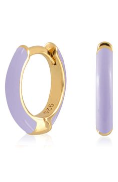 Easy-to-wear hoop earrings will add significant polish to even your most casual ensembles. 1/2" drop; 1/8" width Hinge with snap-post closure Sterling silver with goldtone plate/enamel Imported Trendy Gold Enamel Hoop Earrings, Hoop Huggie Earrings In Enamel, Trendy Small Hoop Purple Jewelry, Trendy Purple Small Hoop Jewelry, Trendy Enamel Hoop Jewelry, Everyday Enamel Hoop Earrings, Nickel-free Enamel Hoop Earrings, Trendy Enamel Huggie Earrings, Nickel Free Enamel Hoop Jewelry