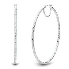 Dress gorgeous with these ultra-classic large hoop earrings in 14K white gold. The polished design features intricate diamond-cut facets that capture light for a glimmering reflection. Take your earring lineup to the next level with an accessory sure to make a striking impression. | Large Hoop Earrings with Diamond Cut | 14K White Gold | Size 50.00mm | Helzberg Diamonds Hammered White Gold Earrings For Anniversary, White Gold Hammered Earrings For Anniversary, Anniversary White Gold Hammered Earrings, Platinum Diamond Cut Hoop Earrings, Hammered Hoop Earrings For Anniversary, Elegant Faceted Hoop Jewelry, Elegant Hammered Sterling Silver Hoop Earrings, Elegant Hammered Hoop Earrings For Anniversary, Formal White Gold Hoop Earrings With Diamond Cut