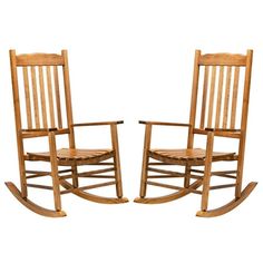 two wooden rocking chairs sitting next to each other