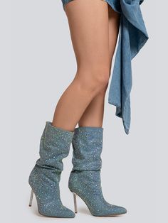 Shop for Kayla Rhinestone Embellished Stiletto Denim Mid Calf Boots at Glory Connection. Free shipping on orders over $75. Shaft Material: Satin Outsole Material: Rubber Upper Material: Denim Heel Type: Square heel Lining Material: PU Boot Height: Knee-High Designer Style ID: GC101-41235 Stand out from the crowd in our Kayla Boots. They're designed with a slouchy silhouette and are entirely covered in rhinestones, Blue Rhinestone Boots For Spring, Spring Blue Boots With Rhinestones, Blue Rhinestone Boots For Fall, Fitted Denim Blue Boots For Party, Fitted Denim Boots For Party, Denim Blue Party Boots, Fitted Denim Blue Party Boots, Denim Pointed Toe Boots For Party, Party Denim Blue Pointed Toe Boots