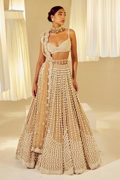 Beige attached cancan lehenga with all-over chandelier pearl embellishments. Comes with sleeveless pearl drop sweetheart neck padded blouse and a dupatta. - Aza Fashions Lehenga With Pearls, Vani Vats Lehenga, Pearl Blouse Designs, Pearl Lehenga, Beige Lehenga, Vani Vats, Cancan Lehenga, Simple Lehenga, Lehenga Designs Simple