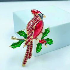 Red Cardinal Brooch Rhinestone Bird Enamel Pin Gold Branch Holiday Heaven Pretty Sparkle Brand New In Original Package No Tags Attached Sparkling Red Cardinal Bird Brooch Pin Gold Tone Color With Rhinestones Great For Shirts Coat Jacket Shawl Scarf Hat Gift Party Work Office School Gift Stocking Stuffer ***Check Out My Other Items** Bundle & Save $$ On Shipping!!! (2aa169) Tags Home, Country ,Collectable, Vintage, Figurine ,Office, Boho, Hippie, Stylish, Gift, Fashion, Surfer, Vacation, Beach, U Elegant Red Christmas Brooches, Elegant Red Holiday Brooch, Elegant Red Holiday Brooches, Holiday Red Brooch Jewelry, Red Holiday Brooch, Red Brooch Jewelry For Valentine's Day, Red Valentine's Day Brooch, Elegant Holiday Jewelry Brooch, Red Rhinestone Brooch For Gift