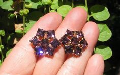 So beautiful! These lovely vintage earrings have no markings. They stones are purple rhinestones, all prong set. The outer layer is square cut stones, the center being round. They measure 7/8" across and have screw backs for fasteners. So nice! Purple Rhinestone, Amethyst Purple, Square Cut, Star Flower, Vintage Engagement, Screw Back Earrings, Vintage Engagement Rings, Earrings Gold, Vintage Earrings