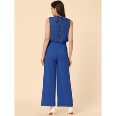 Features a high waist design that accentuates your figure and makes you look taller. The wide flare leg cut of the jumpsuit creates a flowy and feminine silhouette that flatters different body shapes. Made from comfortable materials, this jumpsuit is durable, breathable, and comfortable. It is perfect for both casual and dressy occasions, making it versatile and practical comes in a variety of sizes to ensure a perfect fit for every woman. Chic Blue Wide-leg Jumpsuits And Rompers, Chic Blue Wide Leg Jumpsuits And Rompers, Elegant Blue Strapless Jumpsuit, Chic Blue Sleeveless Jumpsuits And Rompers, Maxi Jumpsuit, Jumpsuit Dressy, Knit Jumpsuit, Feminine Silhouette, Women Maxi