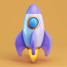 a blue and yellow toy rocket sitting on top of a brown table next to an orange wall