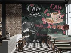 the interior of a cafe with tables, chairs and chalkboard on the wall behind them