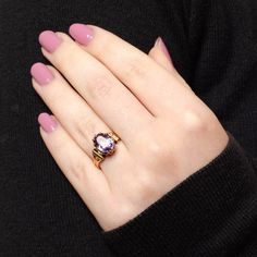 This antique ring (circa 1900) features a purple amethyst set in 14k gold. The face of the ring measures 0.5 inches by 0.4 inches wide, and it is in great condition. The ring is a size 6.5, but it can be resized free of charge. Materials: 14k gold, Amethyst. 14k Gold Amethyst Open Ring, Classic 14k Gold Amethyst Birthstone Ring, Victorian Purple Ring With Center Stone, Victorian Style Purple Ring With Center Stone, Classic Purple Ruby Ring, Heirloom 14k Gold Purple Birthstone Ring, Heirloom 14k Gold Amethyst Birthstone Ring, Heirloom Purple Birthstone Ring In 14k Gold, Purple Heirloom Birthstone Ring In 14k Gold