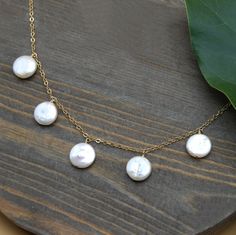 This freshwater pearl necklaces features delicate petite pearl coins on an 18k gold fill cable chain. It is another staple item, as pearls are timeless, and whats better than one pearl..more pearls, of course! Rice Pearl Necklace, Coin Pearl Necklace, Dangle Necklace, Coin Pearls, Pearl Necklaces, Freshwater Pearl Necklaces, Cable Chain, Pearl Jewelry, Jewelry Inspiration