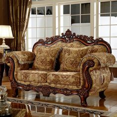 a living room filled with furniture and windows