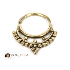 A gorgeous septum ring in Indian tribal shape, with small dots inside and outside. For a pierced nose! It can be worn as tragus earrings or small hoop earrings as well. For a non-pierced nose that everywhen can wear, from the same design, click here: https://www.etsy.com/listing/195375152 Description ♦ Material: Brass or Sterling silver or Gold plated brass or 14k solid yellow gold - choose during checkout ♦ Gauge / Bar size: 18G (1mm) or 16G (1.2mm) or 14G (1.6mm) - choose during checkout ♦ Inn Gold Bohemian Nickel-free Septum Ring, Handmade Gold Bohemian Septum Ring, Handmade Bohemian Gold Septum Ring, Bohemian Nickel-free Round Septum Ring, Bohemian Handmade Gold Septum Ring, Handmade Bohemian Round Septum Ring, Bohemian Handmade Round Septum Ring, Bohemian Gold Septum Ring For Festivals, Bohemian Round Septum Ring As Gift