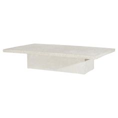 a white table with a square base on the top and one section missing from it