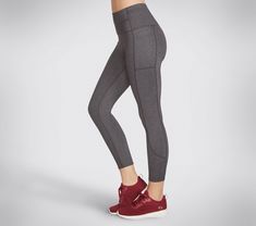 Get workout-ready and pair up with an athletic essential wearing the Skechers GO WALK Wear High-Waisted 7/8 Legging. This active high-waisted 7/8 legging features a GOFLEX moisture-wicking nylon and spandex blend fabric, chafe-free seams for total comfort and exterior side pockets. | Skechers Women's GO WALK High-Waisted 7/8 Legging Sporty Moisture-wicking Mid-rise Activewear, Sporty Mid-rise Moisture-wicking Activewear, Moisture-wicking Sportswear Leggings For Light Exercise, Mid-rise Moisture-wicking Sporty Activewear, Moisture-wicking Leggings For Light Exercise, Functional Mid-rise Workout Leggings, Breathable Sporty Leggings For Light Exercise, Athleisure 4-way Stretch Yoga Pants With Go-dry, Moisture-wicking Mid-rise Activewear For Sports