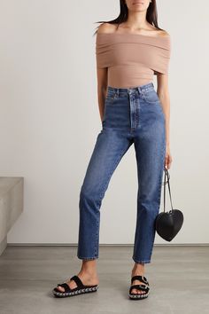 Alaïa's jeans are made with the same careful precision as the label's leather goods - the seaming on the back yoke is purposely placed to flatter your frame. Cut from structured denim, they're designed to sit high on the waist and have straight legs that hit just above the ankles. The classic blue wash will go with anything in your closet. Classic Blue, Net A Porter, Women Collection, Straight Leg Jeans, Fashion News, Luxury Design, Mom Jeans, Blue Denim, Porter