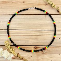 Rasta Style Beaded Choker Colorful Necklace Beach Choker | Etsy Casual Wooden Beads For Festival, Bohemian Black Beaded Necklaces For Summer, Black Beaded Necklaces For The Beach, Black Necklaces With Large Beads For Beach, Colorful Adjustable Casual Beads, Casual Wooden Beaded Necklaces, Black Necklaces With Colorful Beads For Beach, Casual Large Summer Beads, Black Necklaces For Summer Vacation