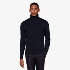 A versatile shade meets a classic winter style in this luxurious navy turtlneck sweater-wear it on its own or pair it with a jacket for a casually refined take on seasonal styling. Ribbed Collar Turtleneck For Fall Workwear, Fall Turtleneck With Ribbed Collar For Work, Fall Ribbed Collar Turtleneck For Work, Fall Workwear Turtleneck With Ribbed Collar, Formal Merino Wool Sweater For Winter, Elegant Winter Business Sweater, Elegant Business Winter Sweater, Modern Polo Sweater For Work In Fall, Elegant Business Sweater For Winter