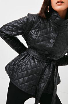 Women's Quilted Leather Jacket In Black Outer Shell: Real Leather Leather Type: Lambskin Leather Finish: Semi-aniline Inner Shell: Viscose Lining Features: Belted Waist & Quilted Closure Style: Buttons Collar Style: Band With Button Cuffs Style: Button Inside Pockets: One Color: Black Luxury Black Quilted Jacket For Winter, Luxury Black Quilted Jacket, Classic Black Quilted Jacket For Work, Black Fitted Quilted Outerwear, Fitted Black Quilted Outerwear, Black Quilted Leather Jacket For Winter, Fall Black Blazer With Padded Collar, Black Fall Blazer With Padded Collar, Black Blazer With Padded Collar For Fall