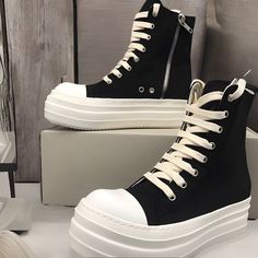 Elevate your footwear game with our exceptional collection of Rick Owens Unisex Shoes! Introducing the epitome of style and comfort, these SBlack genuine  HI tops Rick Owens sneakers are a must-have addition to any fashion-conscious individual's wardrobe. Embrace the trendsetting elegance and versatility that these sneakers bring to your ensemble. Key Features: Heel Height: With a flat sole (≤1cm to 3cm )Please these sneakers offer unparalleled comfort, making them perfect for all-day wear. Perfect Fit: Our sneakers are designed to fit true to size, ensuring a comfortable fit that embraces your feet. Take your normal size for the perfect fit. Lining Material: Crafted with high-quality canvas, these sneakers offer breathability and a soft interior, enhancing your overall comfort. Season: Id Platform High-top Sneakers For Streetwear, Flat Heel Platform High-top Sneakers For Streetwear, Streetwear High-top Platform Sneakers, Streetwear Platform Canvas Shoes With Round Toe, Platform Canvas Shoes With Round Toe For Streetwear, Streetwear Canvas Shoes With Platform And Flat Heel, Flat Heel Platform Canvas Shoes For Streetwear, Ankle-high Platform Canvas Shoes For Streetwear, Platform Canvas Shoes With Flat Heel For Streetwear