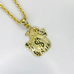 10k Solid Gold Money Bag Lucky Charm Pendant Necklace for Men Women * Metal : Real 10K Yellow Gold * Condition : Brand New * Finish : Polished * Height : 21.8mm * Weight : 2.2 gram * Necklace (optional) : 2.0mm Rope Chain This is an approximate size & weight. Please expect up to ±10% difference. * Processing time : 1~3 business days * Ships from California This is 100% Authentic 10k Gold. Not plated or filled. All of our items are brand new and are shipped with a gift box. Wealth Symbol, Money Necklace, Real Gold Necklace, Nike Bags, Expensive Jewelry Luxury, Gold Money, Symbol Necklace, Expensive Jewelry, Charm Pendant Necklace