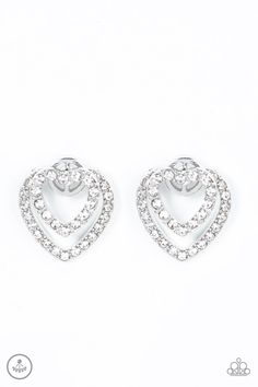 A dainty silver heart dotted in glassy white rhinestones flirtatiously attaches to a double-sided post, while a slightly larger white rhinestone encrusted silver heart peeks out beneath the ear for a romantic finish. Earring attaches to a standard post fitting. Sold as one pair of double-sided post earrings. Rhinestone Heart, Paparazzi Accessories, White Rhinestone, The Ear, Affordable Jewelry, Paparazzi Jewelry, White Earrings, White Heart, Heart Earrings