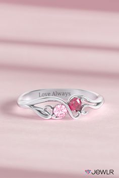 This detailed, delicate style is sure to capture the heart of anyone who wears it. This personalized promise ring features a divided dainty band swirling around two sparkling birthstones to represent you both. This sparkling design would make a romantic gift for her or the perfect gift for your girlfriend. #Jewlr #PromiseRing #BirthstoneJewelry #PersonalizedJewelry #Rings Cute Promise Rings Girlfriends, Unique Promise Rings For Her, Promise Ring Ideas, Ring With Birthstones, Promise Rings Pandora, Personalized Promise Rings, Cute Promise Rings, Birthstone Promise Rings, Mother's Ring