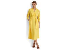 LAUREN Ralph Lauren Long Sleeve Day Dress - Women's Clothing : Yellow Lily : The LAUREN Ralph Lauren Long Sleeve Day Dress is a Surplice Georgette Midi Dress featuring a faux-wrap bodice, a belted waist, and side on-seam pockets. Lightweight and breathable fabric. Collar with swooping V-neckline. Long sleeves with tie detail on waistline. Side on seam pockets. 100% polyester. Dry clean. Imported. Spring V-neck Dresses With Belted Cuffs, Chic V-neck Dress With Belted Cuffs, V-neck Belted Dress For Work, Fitted V-neck Belted Dress For Daywear, Spring V-neck Belted Dress, Spring V-neck Belted Work Dress, Belted Spring Dresses With Surplice Neckline, Daywear Dress With Tie Waist And Surplice Neckline, V-neck Belted Wrap Dress For Daywear