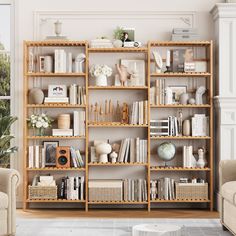 a living room filled with lots of furniture and bookshelves on top of each other