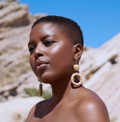 Elevate your boho chic style with these stunning natural hemp hoop dangle earrings. Measuring approximately 3.5 inches (8.9 cm) in length, these earrings are meticulously handcrafted with earthy brown and khaki-colored hemp, accented by 4mm tigers eye gemstones. The elegant gold plated leverback closures add a touch of glamour to these rustic and nature-inspired earrings.Materials:Natural Hemp: These earrings feature natural hemp cord in earthy brown and khaki hues, adding a touch of rustic char Hoop Dangle Earrings, Earthy Brown, Boho Chic Style, Free Spirit Style, Tigers Eye Gemstone, Jade Beads, Tigers Eye, Stunning Earrings, Sensitive Ears