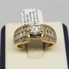 Vintage 14K Yellow Gold with an Est. .55 Carat Main Diamond Ring, Size 6.5. Stamped 14KP W.J. inside band. Main stone is 5mm. There is 14 smaller diamonds on each side of the main stone. Band has some nicks to it. Weighs 5.2 dwt. We do not check prongs for wear or stones for looseness. All items are sold as is-noting that we are a resale shop so everything here had a previous owner! We will include flaws in the description when noted. This is one of the reasons our items are more affordable than new at a jewelry store. Are these stones real or fake? Aside from diamonds, we do not know if any gemstones are natural or synthetic. We will state on certain gemstones, that we know 100%, if they are created or fake due to their lack of inclusions. For this reason, we do not sell any diamonds with European Jewelry, Vintage Fine Jewelry, Star Sapphire, Pure Gold, Selling Jewelry, Jewelry Store, Rings Statement, Jewelry Stores, Statement Rings