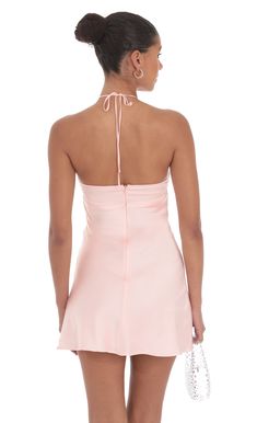 Designed in Los Angeles- Mini Length- Zipper and back tie closure- Fully lined- Sheer- Made in satin fabric- Hand wash coldModel is wearing a size small that measures 31in/79cm in lengthSlight modifications might be made to improve garment quality.Handling the garments with care, hand-washing and air-drying is strongly recommended. Hoco Inspo, Satin Halter Dress, Women Sleepwear, Floral Halter Dress, Loungewear Jumpsuit, Silk Mini Dress, Casual Wedding, Hoco Dresses, Mini Dresses