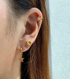 "Flower ear cuff Details - Materials * Gold plated 18 carat over 925 sterling silver * Available also in 925 sterling silver * Zirconia Stones * Nickel free * Lightweight * Sold in individually or in pairs - Measurements * Length: 14mm * Flower Diameter: 7mm ✔︎Check the other items that this model wears: https://www.etsy.com/listing/840179821/moon-hoop-earring-dainty-minimalist?ga_search_query=moon&ref=shop_items_search_2&pro=1 https://www.etsy.com/listing/795327815/two-studs-chain-earri Dainty Cubic Zirconia Ear Cuff For Everyday, Everyday Cubic Zirconia Huggie Ear Cuff, Dainty Cubic Zirconia Huggie Ear Cuff, Everyday Hypoallergenic Gold Plated Ear Cuff, Gold Plated Hypoallergenic Ear Cuff For Gift, Hypoallergenic Gold Plated Ear Cuff As A Gift, Hypoallergenic Gold Plated Ear Cuff For Gift, Dainty Gold Plated Hypoallergenic Ear Cuff, Dainty Hypoallergenic Gold-plated Ear Cuff