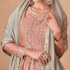 COLOR : Peach & Taupe FABRIC : Top, Bottom & Dupatta - Premium Chinon Silk WORK : Resham Embroidery, Hand Work, Sequins, Motifs, Lace Border OCCASION : Wedding, Reception, Party Wear, Festival READY-TO-WEAR : No STITCHING : Available as semi-stitched fabric, can be stitched using standard size option (+$30). Note: There might be a slight color variation due to lighting and flash used during photoshoot. The bright shade seen is the best closer view of fabric's color. Embroidery Hand Work, Wedding Reception Party, Resham Embroidery, Taupe Fabric, Sharara Suit, Embroidery Hand, Reception Party, Lace Border, Hand Work