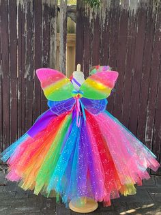 Welcome to Baby/Infants Clothing by Funkids&Us Boutique Adorable Glittery Rainbow/Multi Color Tea length tutu Dress  This Rainbow inspired Tutu is so sweet and perfect for little girl who love Rainbow theme party, Tutu is made from Premium soft tulle rainbow color coordinated.  This Rainbow Tutu Dress is made with light green,yellow,orange,red,blue,lavender,purple,and hot pink color is individually tied tightly onto the base of the crochet bodice so that it will not come off, Dress featured a th Tulle Rainbow, Rainbow Tutu Dress, Rainbow Costume, Ballerina Flower, Rainbow Costumes, Birthday Tutu Dress, Rainbow Theme Party, Blue Tutu, Handmade Tutu