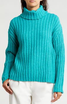 Thick ribbing texturizes this cozy sweater that's a comfy go-to for staying warm when the temp drops. Turtleneck Long sleeves 100% polyester Hand wash, dry flat Imported Textured Crew Neck Sweater For Fall, Textured Crew Neck Fall Sweater, Textured Long Sleeve Sweater For Layering, Casual Long Sleeve Textured Sweater, Casual Textured Long Sleeve Sweater, Casual Snug Ribbed Sweater, Casual Snug Fit Ribbed Sweater, Relaxed Fit Ribbed Turtleneck Sweater, Ribbed Relaxed Fit Turtleneck Sweater