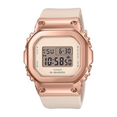 For active women who need tough timekeeping, this Casio G-Shock Digital watch pairs style with resilience. This watch features the classic G-Shock square shaped face with an updated rose gold-tone stainless steel bezel for a chic, metallic look that is still lightweight. This bezel has a mirror finish and is paired with a pink resin band, for an on-trend monochromatic look. Boasting shock resistance, 200 meter water resistance, multi-function alarms, and a full auto-calendar this watch is skillf Casio Quartz, Rose Gold Lights, Fitness Armband, Rose Gold Watches Women, Rose Tone, Baby G, Watch Women, Casio G Shock, Skagen