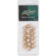 wooden balls in plastic packaging on a white background