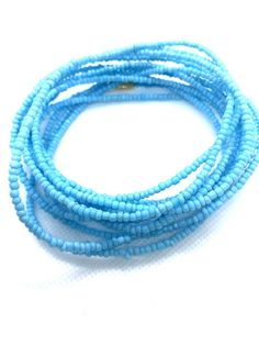 Sky Blue Waist Beads - African Waist Beads - Waist Beads - Body Jewelry - Belly Chain - waistbeads - Blue Beaded Chain Bracelets For Beach, Blue Beaded Waist Beads, Turquoise Multi-strand Tiny Beads, Blue Multi-strand Beaded Bracelets For Beach, Blue Multi-strand Beaded Bracelets With Tiny Beads, Adjustable Blue Waist Beads For Beach, Blue Multi-strand Hand-strung Beads, Blue Strand Beaded Bracelets With Tiny Beads, Blue Multi-strand Beads